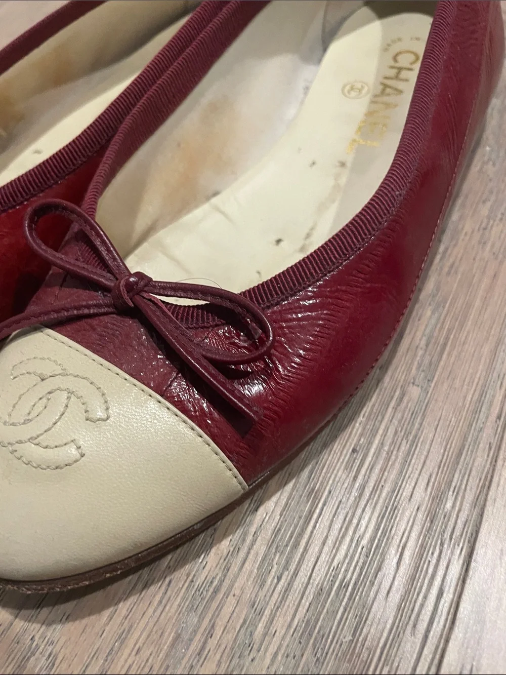 CHANEL Burgundy Eel Skin and Cream Cap-Toe Ballet Flats